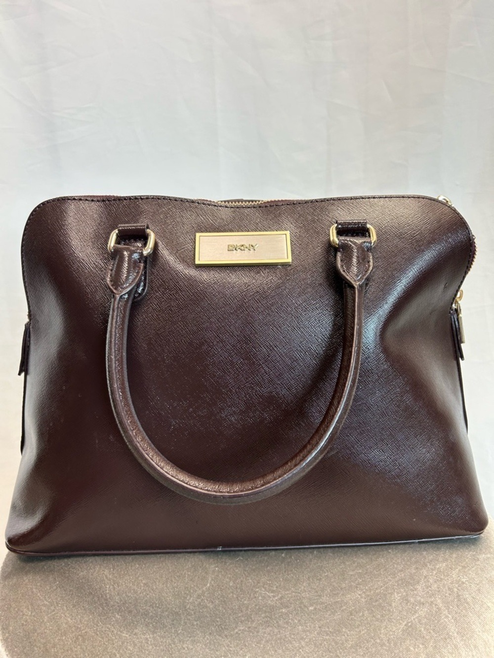 DKNY deep burgundy brown crosshatched leather satchel DKNY plaque